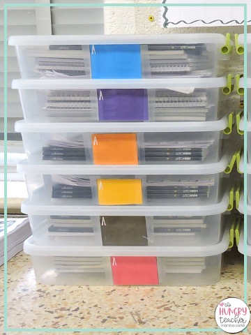 SMALL GROUP SUPPLIES ORGANIZED BY COLORS IN BINS